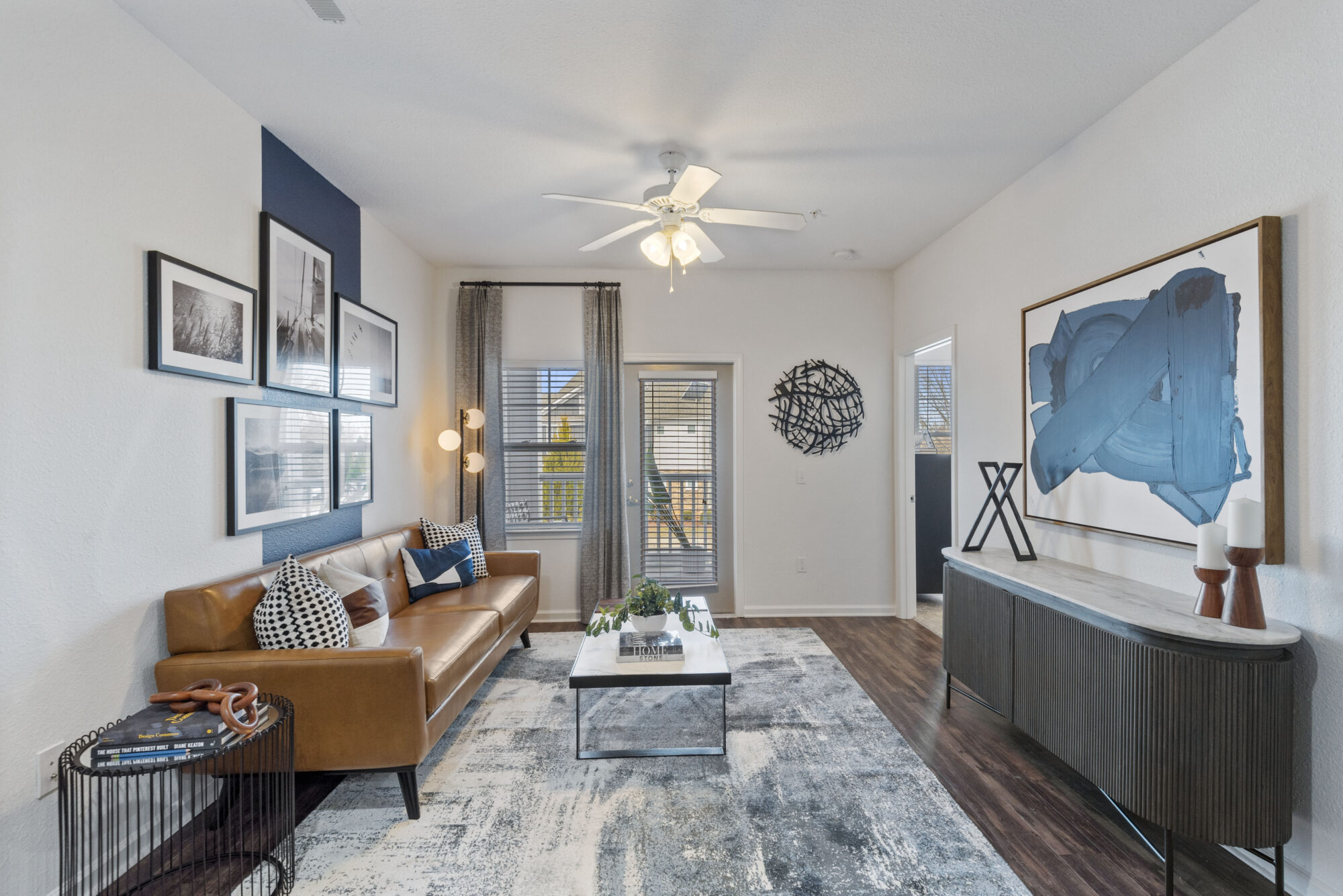 Living room with large windows and patio door